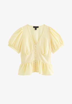 Blusa amarilla pálida de manga corta con mangas abullonadas, escote en V, botones delanteros, bajo peplum recogido y tela texturizada.