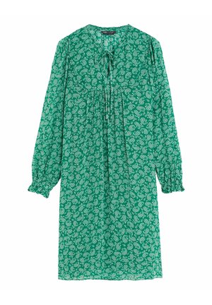 Zielona sukienka na długi rękaw o długości do kolan z białym wzorem paisley, marszczonymi mankietami i wiązaniem przy dekolcie.