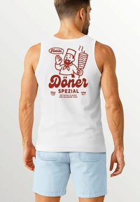White tank top featuring red graphic design of a smiling chef holding a döner, with text "Döner Spezial" and other details below.
