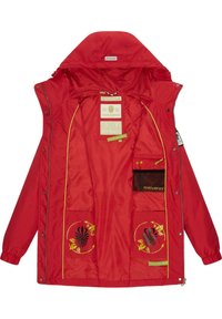 Red nylon jacket with a hood, featuring yellow accents, inner pockets, and floral graphic prints. Lined interior with brand label.