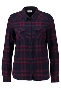 Marineblauwe en bordeauxrode geruite shirt met lange mouwen, knoopsluiting aan de voorkant, twee borstzakken en een puntige kraag. Zachte stoftextuur.