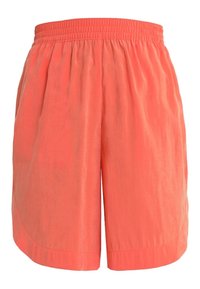 Shorts de couleur corail avec une ceinture élastique. Confectionnés dans un tissu léger, ils présentent une coupe ample et un ourlet incurvé. Texture lisse.