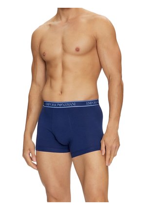 Navy blue cotton boxer briefs with a soft elastic waistband featuring the Emporio Armani logo in light gray. Smooth texture, fitted design.