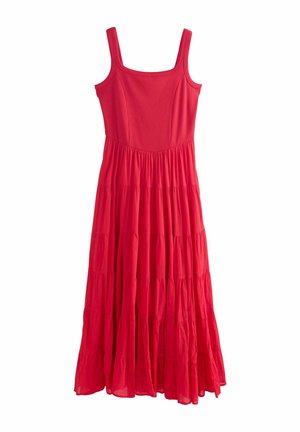 Sleeveless red maxi dress with fitted bodice and tiered, flowing skirt made of lightweight fabric.