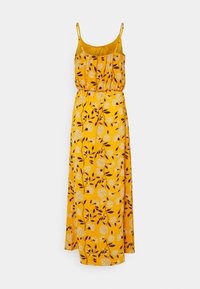 Maxiklänning i ljusgul tyg med blommönster i vitt och svart. Har justerbara axelband och ett elastiskt midjeband.