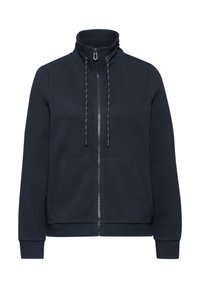 Felpa zip-up blu mare con colletto alto, dettagli con cordino, due tasche frontali e polsini e orlo a costine. Tessuto morbido.