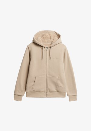 Sudadera beige con cremallera frontal, cordones y forro suave y con textura. Cuenta con bolsillos tipo canguro y puños y dobladillos acanalados.