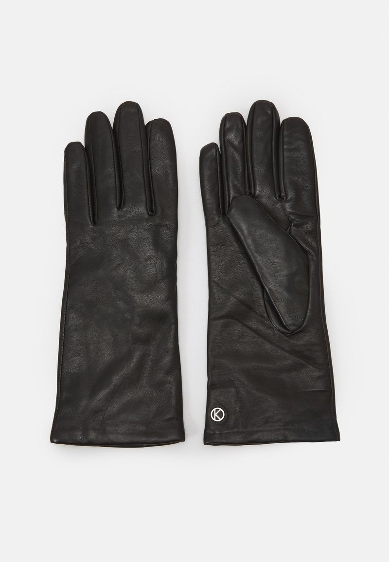 Black leather gloves with five fingers, smooth texture, tailored fit, and subtle stitching details. Features a small logo on the wrist.