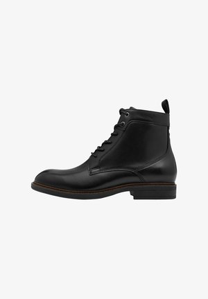 Schwarze Leder-Ankle-Boots mit Schnürdesign, runder Spitze und einer Ziehlasche hinten. Verfügt über einen niedrigen gestapelten Absatz und braune Kontrastnähte.