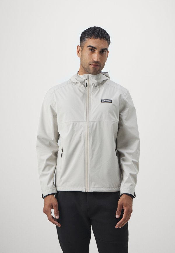 FEATHER DRY WATERPROOF SHELL JACKET - Regenjacke / wasserabweisende Jacke - sand