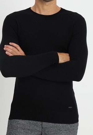 Striktrøje - black