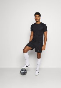 Nike Performance Calções desportivos - black/white