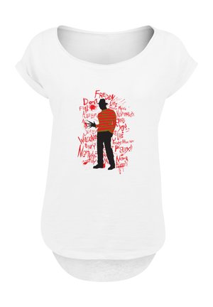 White short-sleeve top featuring a graphic of a character in red and black stripes, with text elements in various fonts and red accents.
