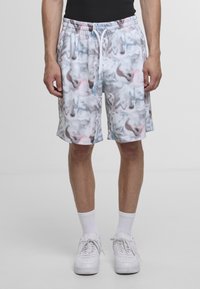 Sportsshorts med et flerfarget abstrakt mønster i hvitt, grått og rosa, med elastisk midjebånd og snor.