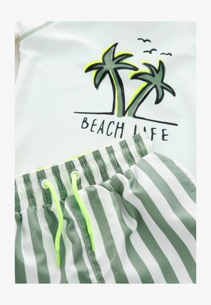 Valge ujumissärk rohelise palmigraafika ja "BEACH LIFE" tekstiga, koos roheliste ja valgete triibuliste lühikestega, millel on neoonaktsendid ja lips.