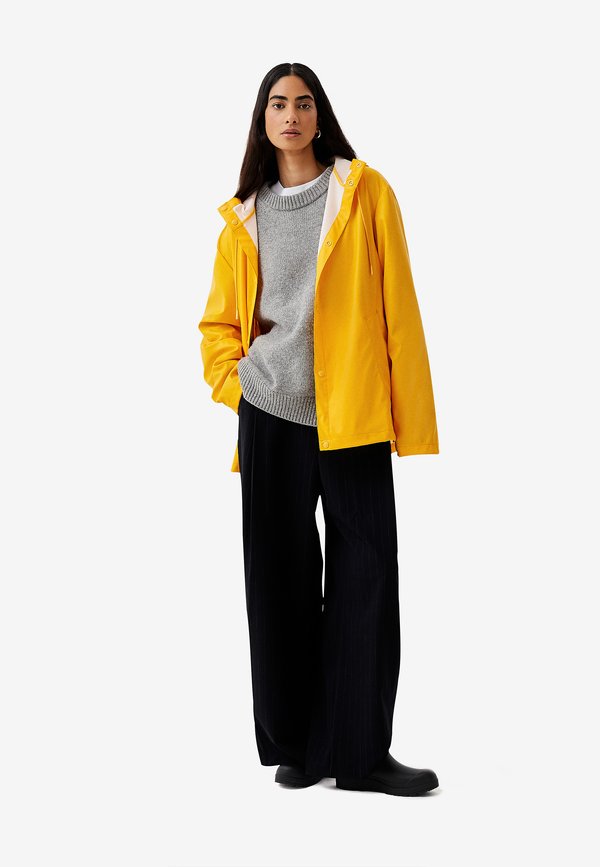 IZZY UNISEX - Waterproof jacket - gold fusion4