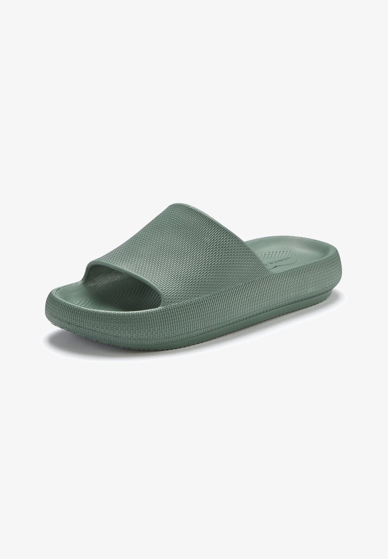 Green slide sandal with a textured upper, open toe, and a wider strap. Made of lightweight material, featuring a contoured footbed and flat sole.