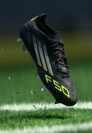 adidas Performance F50 ELITE SG - Soft-ground football boots - core black/iron metallic/lucid lemon