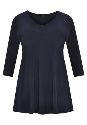 Tunique bleu marine avec un col en V, des manches trois-quarts et une silhouette fluide. Fabriquée en tissu doux, elle présente un design plissé sur le devant.