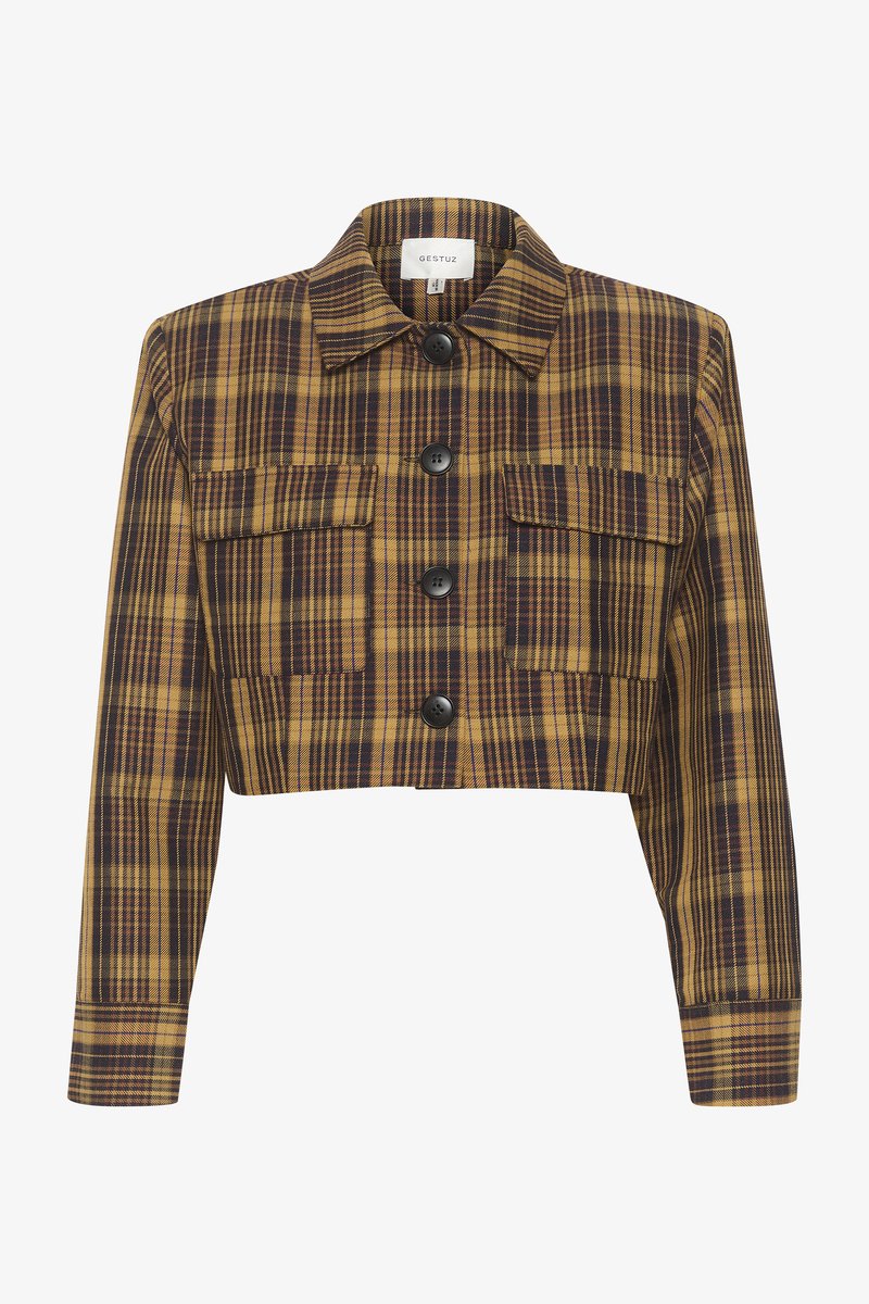 Veste courte à carreaux dans des tons jaune, marron et violet. Comprend un col, une fermeture à boutons et deux poches avant à rabats.