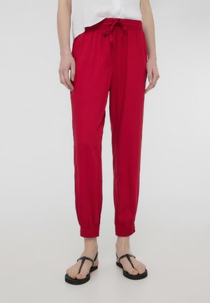 JOGGING WITH A DRAWSTRING AND SOLID CUFFS - Pantaloni sportivi - rosso scuro