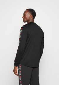 Ellesse NIOMA TEE - Camisola de manga comprida - black