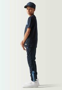 11 DEGREES JOGGERS - Pantalones deportivos - navy elemental blue
