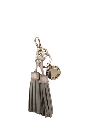 Portachiavi in oro con doppio nappina in pelle beige e ciondolo rotondo in oro inciso con "GAUTINONI ROMA."