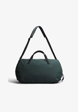 Borsa a sacco verde scuro con manici neri e tracolla regolabile su sfondo bianco.