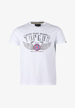 Biała koszulka z napisem "Elite Pilot School TOP GUN", okrągłym godłem marynarki wojennej USA z skrzydłami, dwoma sylwetkami odrzutowców oraz tekstem "Stany Zjednoczone Ameryki" poniżej.