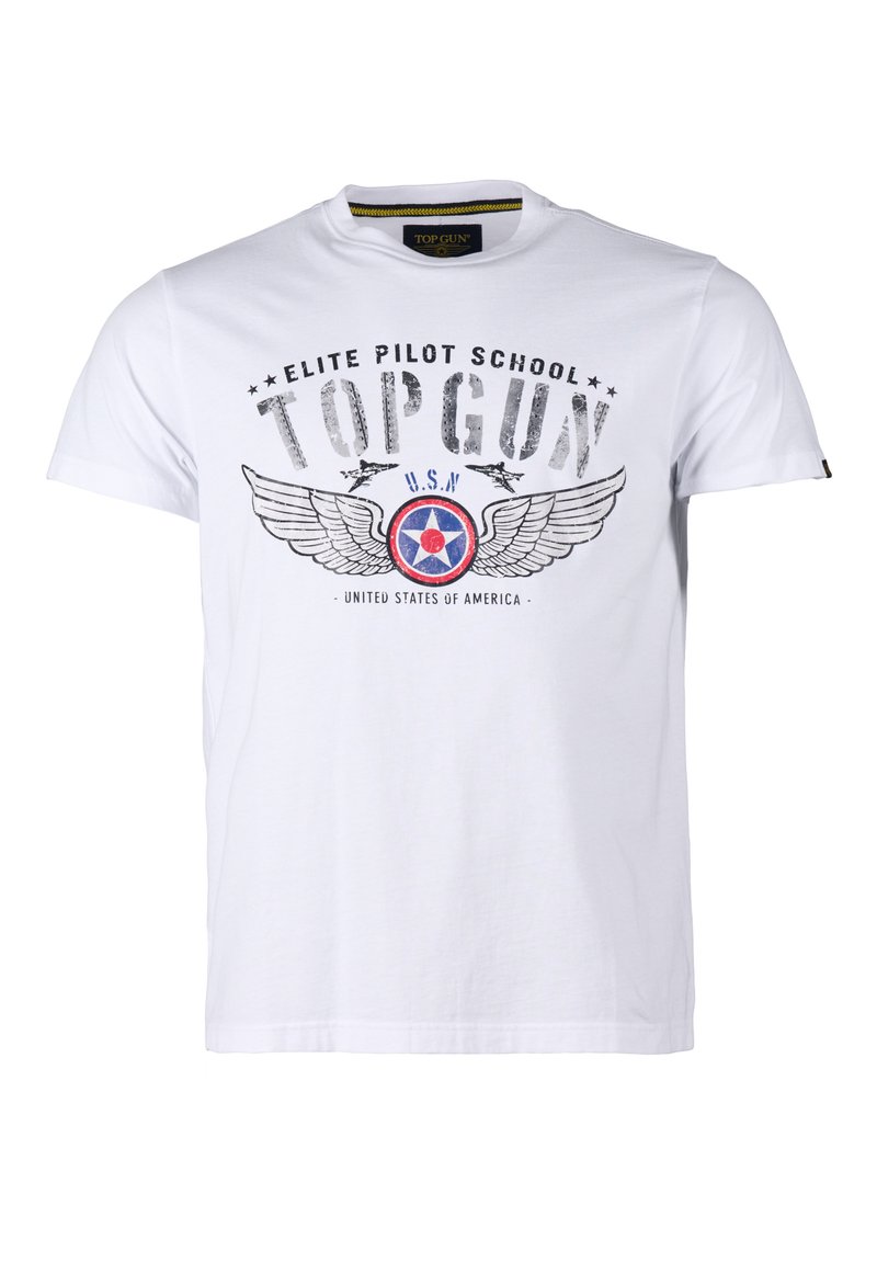 Valkoinen T-paita, jossa on teksti "Elite Pilot School TOP GUN", Yhdysvaltain laivaston rondelli siipineen, kaksi lentokonesilhuettia ja teksti "Yhdysvallat" alapuolella.