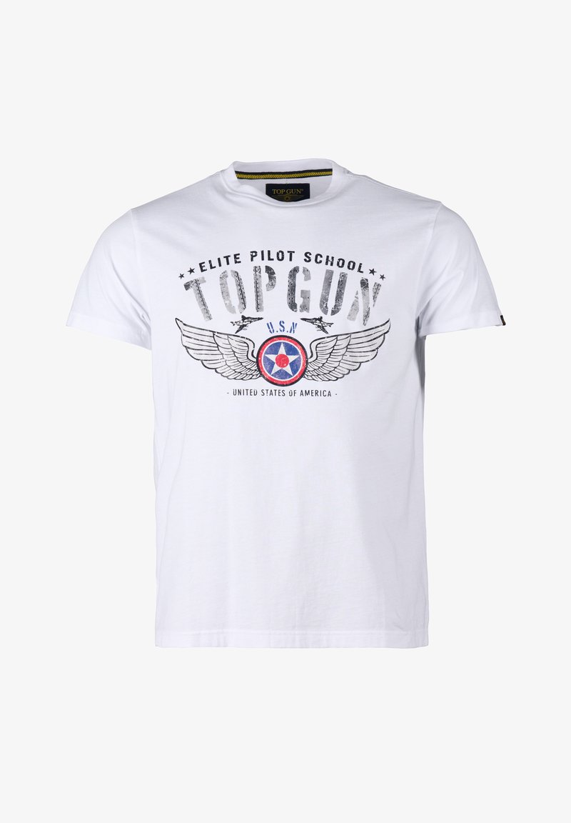 Valkoinen T-paita, jossa on teksti "Elite Pilot School TOP GUN", Yhdysvaltain laivaston rondelli siipineen, kaksi lentokonesilhuettia ja teksti "Yhdysvallat" alapuolella.
