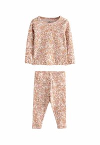 Blommönstrad tvådelad set med en långärmad topp och matchande leggings i mjuka rosa och krämfärgade nyanser, tillverkad av elastiskt material.