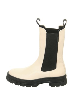 Beige leather ankle boot with a black elastic panel, textured finish, looped pull tabs, and a chunky black rubber sole.