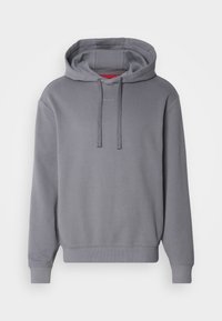 Sweat à capuche gris à manches longues avec cordon, poignets et ourlet côtelés, et petit logo "HUGO" centré sous le col.