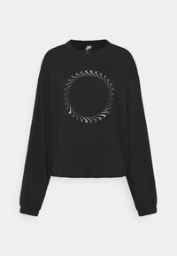 Černá zkrácená mikina s dlouhými rukávy. Na hrudi má stříbrný kruhový spirálový motiv. Vyrobena z měkké, strukturované látky.