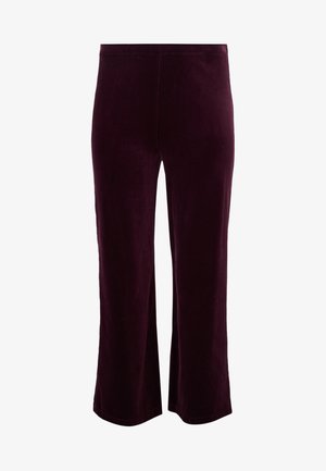 Fluwelen broeken in diep bordeauxrood met een losse pasvorm, uitlopende beenopeningen en een elastische tailleband voor comfort. Soepele textuur overal.