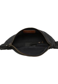 Schwarze Lederhandtasche mit einem goldenen Reißverschluss, ausgestattet mit einem Stofffutter und einer Innentasche mit einem Reißverschluss. Tanfarbenes Lederdetail an der Oberseite innen.
