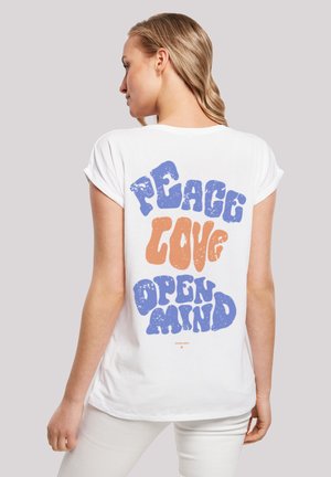 White cotton t-shirt featuring colorful, textured graphic text on the back: "PEACE," "LOVE," and "OPEN MIND" in blue and orange. Short sleeves.