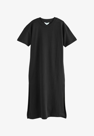 Schwarzes Baumwoll-T-Shirt-Kleid mit kurzen Ärmeln, seitlichen Schlitzen und einem lockeren Schnitt. Leicht abgerundeter Ausschnitt mit minimalen Stichelementen.