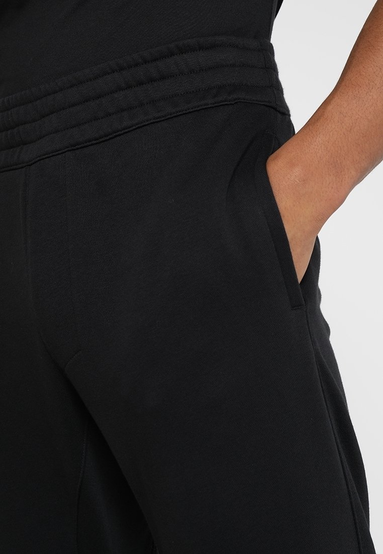 adidas Performance Teplákové kalhoty - black