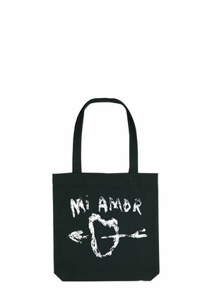 Borsa a spalla nera in tela con testo bianco "Mi Amor" e un cuore decorato con una freccia. Tessuto resistente, due manici.