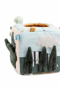 Soft fabric cube toy with pastel colors, cloud and tree designs, various tags, and textured accents. Features a top opening for play.