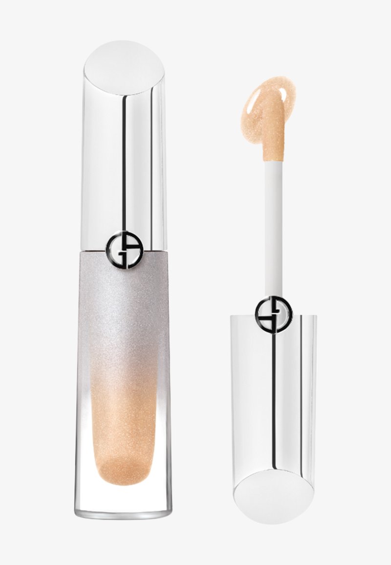 Lipgloss-container met zilveren dop en applicator die een lichte perzikkleurige glans op de applicator toont.