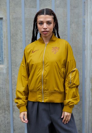 NETHERLAND KNVB ESSENTIAL BOMBER - National team wear - bronzine/safety orange/black