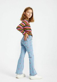 The New EMBROIDERY - Trapezaste traperice - light blue denim