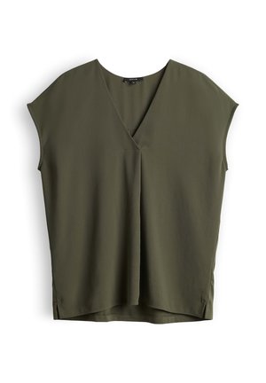 Blouse sans manches vert olive avec col en V et coupe ample, comprenant un détail de chevauchement à l'avant et de petites fentes latérales à l'ourlet.