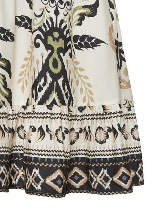 Floral-patterned fabric with black, green, and beige hues. Features ruffled hem and intricate geometric designs, made from textured cotton.