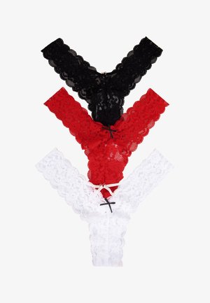 Drie kanten damesstrings in zwart, rood en wit, verticaal gerangschikt met kleine decoratieve strikjes op de voorbanden.