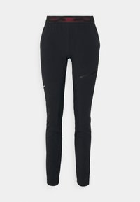 Pantalones deportivos negros con una cinturilla texturizada roja y un bolsillo lateral con cremallera. La tela parece suave con un ajuste delgado y ajustado.